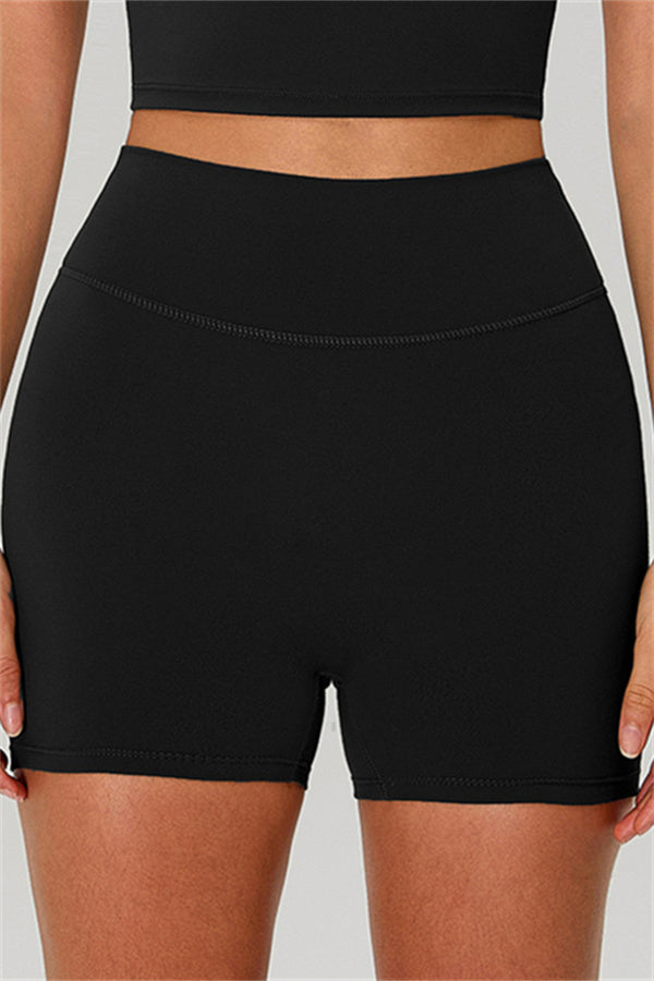 Fitglutes activewear one-shoulder crop top and matching shorts 2-piece gym set, athletic sportswear for workout and fitness.