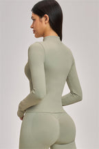 Fitglutes Activewear The Vision Jacket Sports Bra Shorts 3-piece set for workout, featuring a jacket, sports bra, and shorts in matching gymwear.