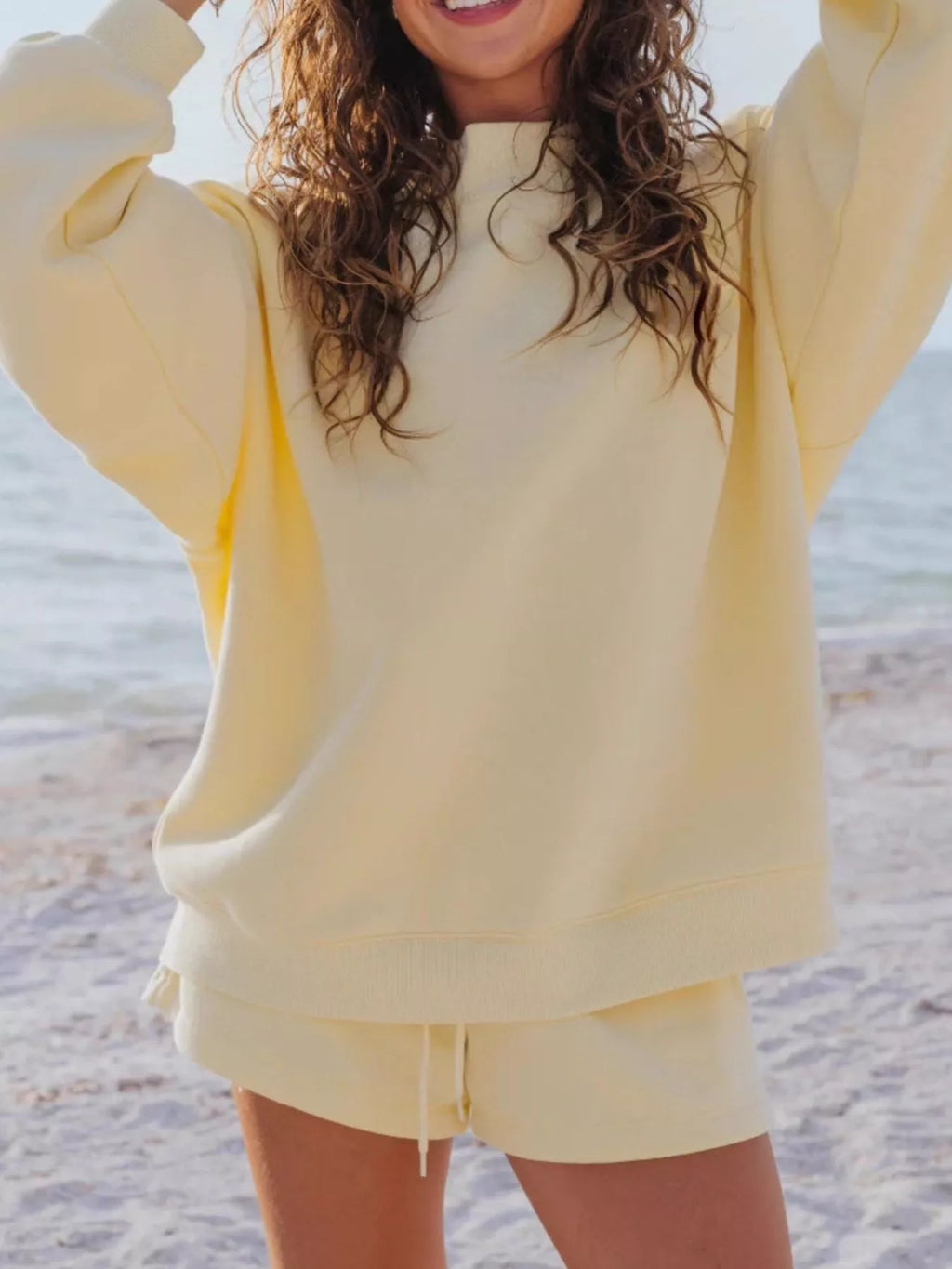 Plush Fashion Hub relaxed fit round neck sweatshirt and shorts set, featuring a comfortable casual 2-piece outfit in soft fabric.