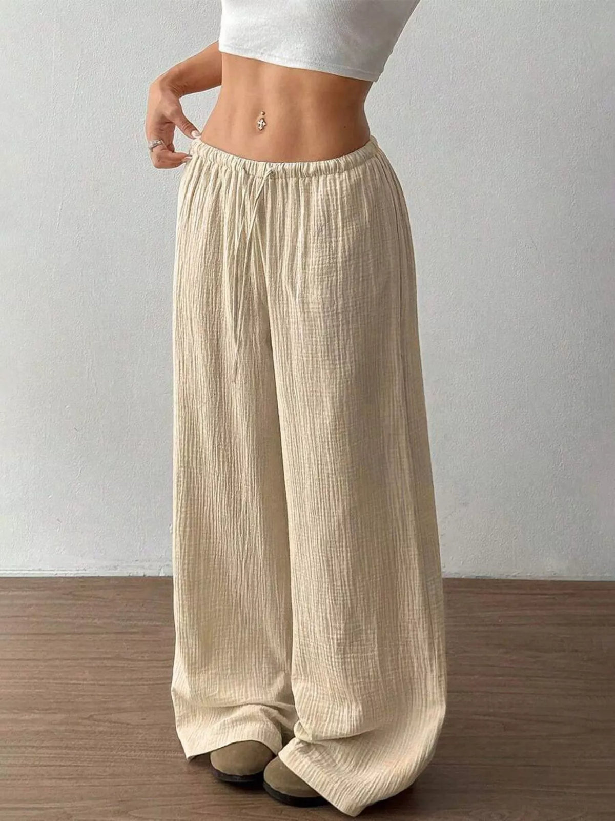 Plush Fashion Hub wide-leg drawstring pants in soft fabric, with a relaxed fit and casual style, shown on a model.