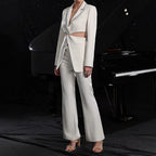 Elegant women's hollow-out long-sleeve suit jacket and pants set by Plush Fashion Hub, stylish and sophisticated apparel for women.