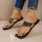 Women's stylish vegan leather toe ring flat sandals with comfortable summer design, featuring open-toe style and minimalist straps.