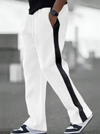 Men's plus size contrast stripe drawstring sweatpants by Trendsi, featuring a comfortable fit and stylish striped design.