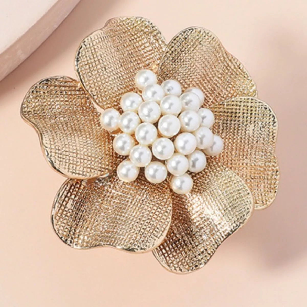 18K gold-plated pearl flower ring with intricate floral design, showcasing a delicate pearl centerpiece and detailed gold petals.