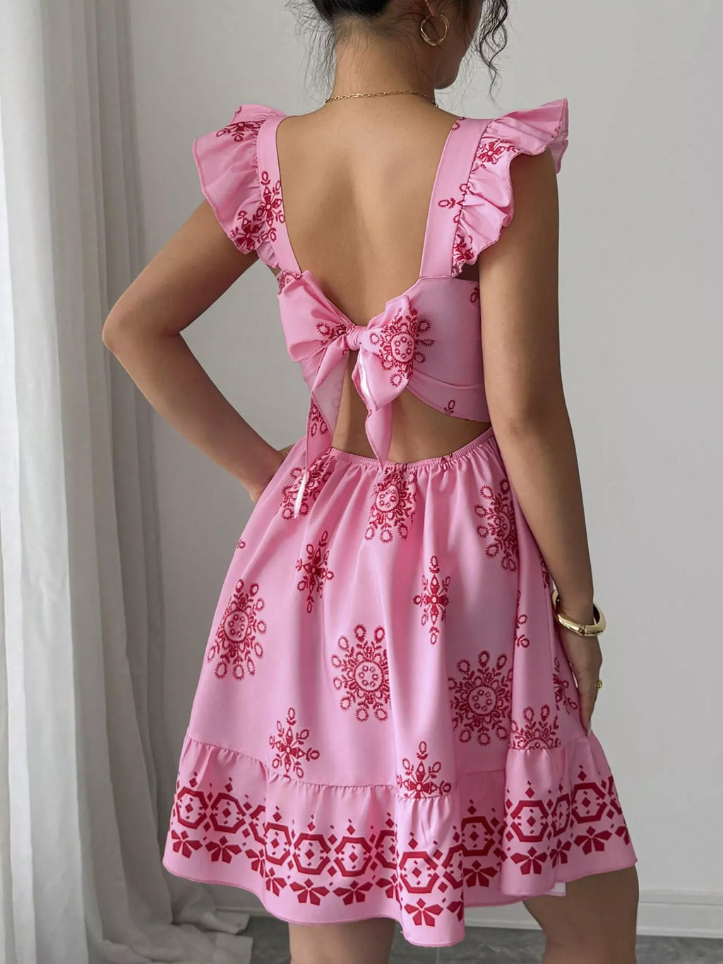 Printed bow back square neck mini dress by Shopimist, featuring a stylish square neckline and bow detail at the back.