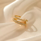 18K gold-plated rhinestone open ring with sparkling stones and sleek band design, showcasing a stylish jewelry piece.