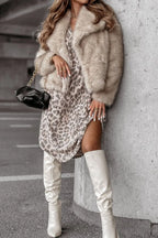 Leopard V-neck long sleeve dress by Plush Fashion Hub featuring a fitted silhouette and stylish animal print fabric.