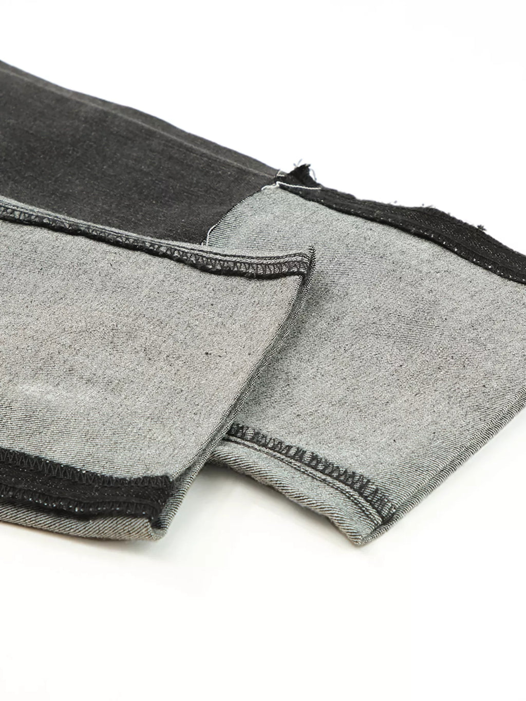 High waist distressed straight leg jeans by Trendsi, showing a close-up of the light-wash denim with ripped details and classic five-pocket style.