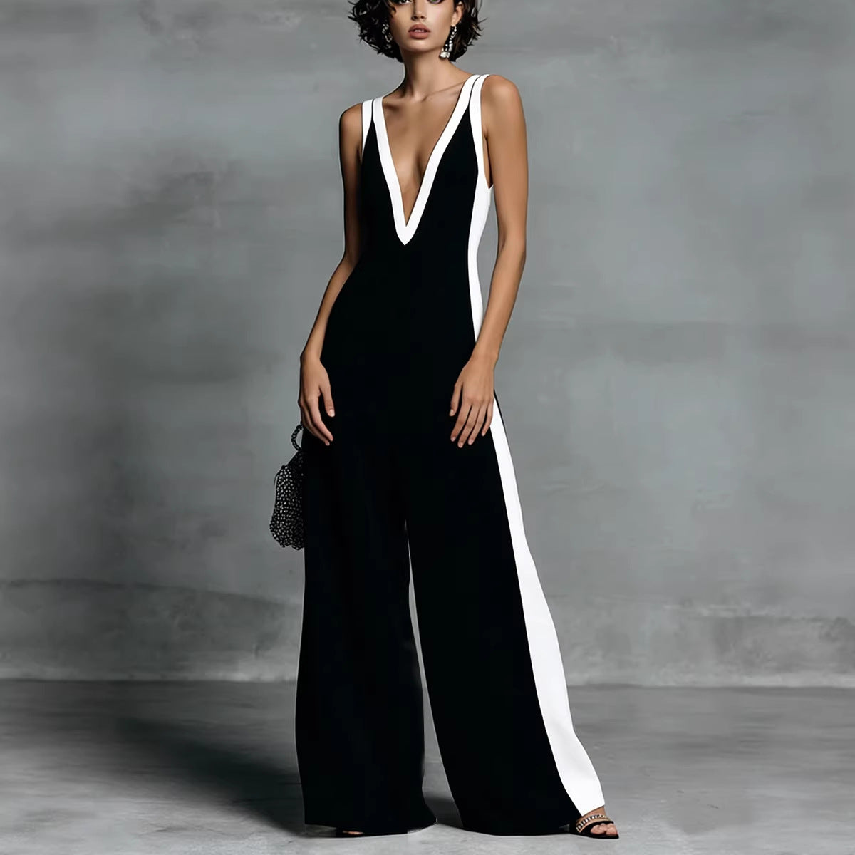Women's color-block sleeveless V-neck jumpsuit with wide-leg pants, casual French style by Plush Fashion Hub.