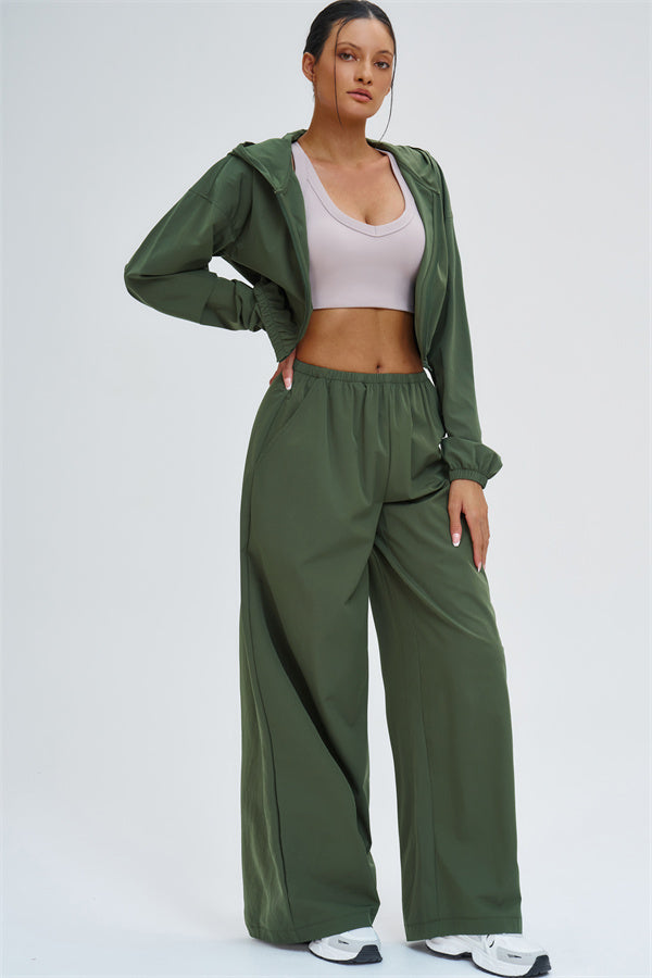Light green Svelte UV protection crop hoodie by Fitglutes Activewear, featuring a fitted design and breathable fabric for workout comfort.