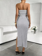Striped tube top and slit skirt set by Trendsi, featuring a stylish matching two-piece design with bold stripes.