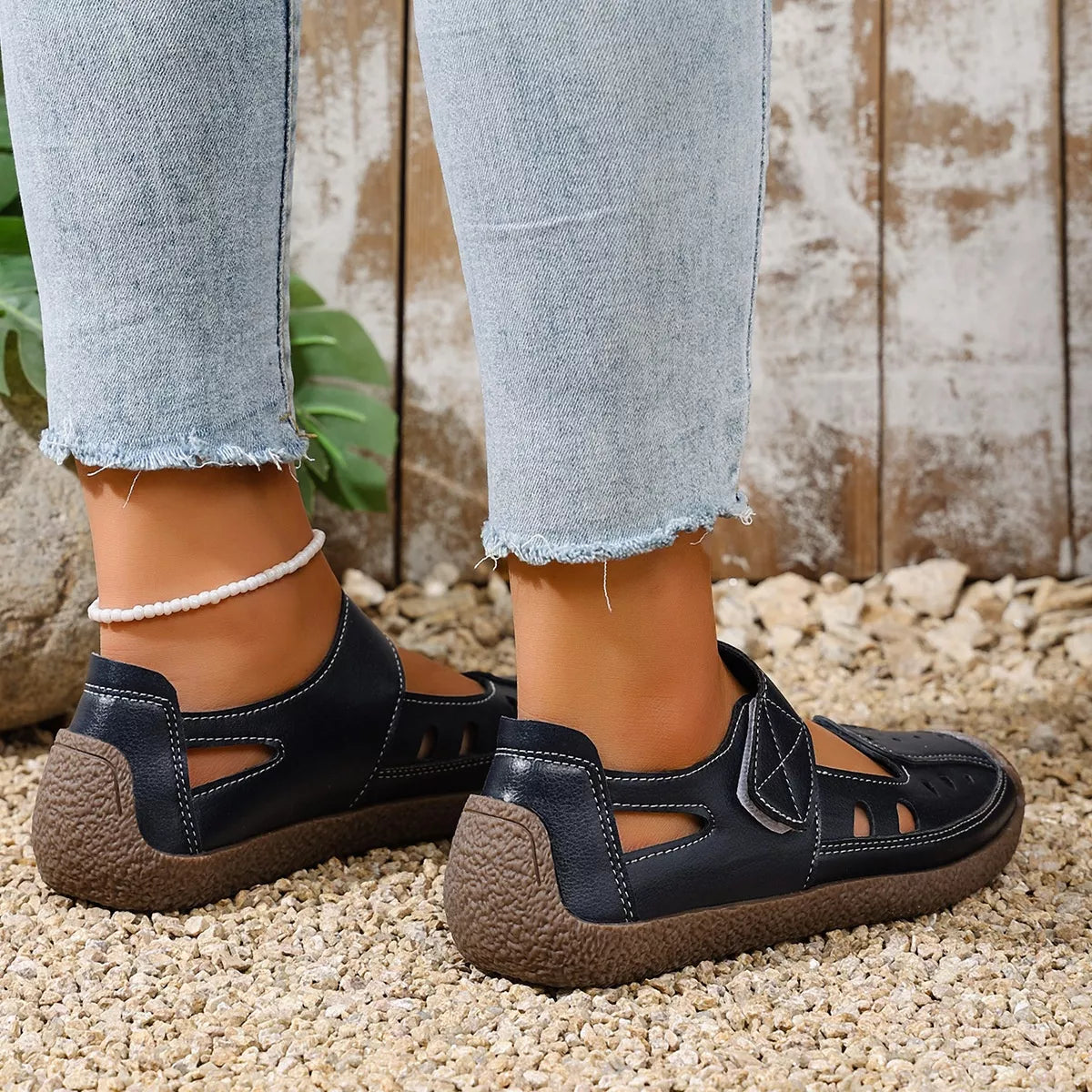 Round toe platform slip-on footwear by Trendsi featuring a sleek design and comfortable fit, ideal for casual or stylish wear