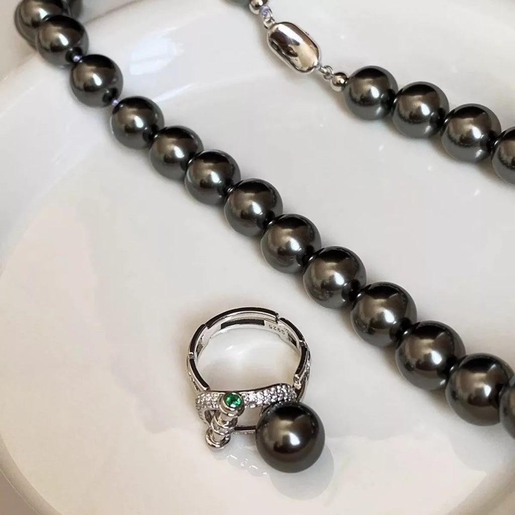 925 sterling silver ring with zircon stones and a pearl accent, elegant jewelry piece from Shopimist
