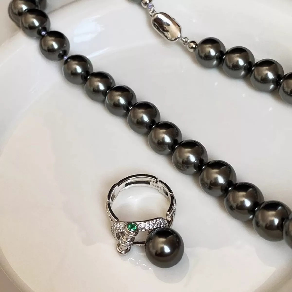 925 sterling silver ring with zircon stones and a pearl accent, elegant jewelry piece from Shopimist