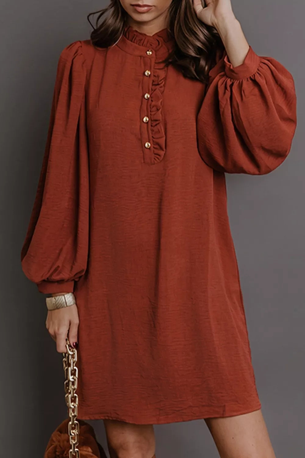 Solid Shift Long Sleeve Short Dress by Trendsi, featuring a chic, fitted design with long sleeves and a short hemline.