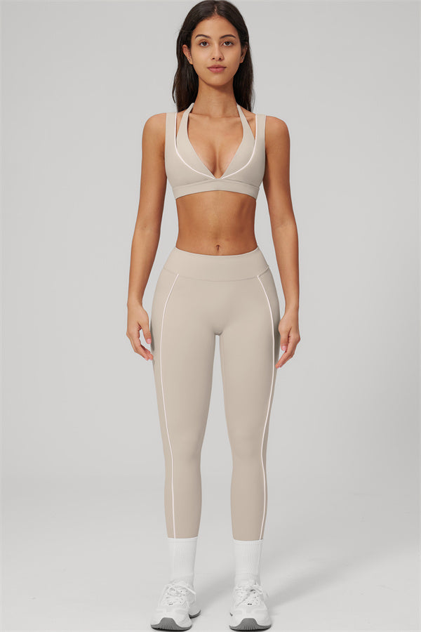 Fitglutes Activewear sports bra and leggings set with contour lines, designed for gym and workout comfort and style.