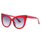 Women’s oversized cat eye sunglasses with UV400 protection from Plush Fashion Hub, stylish black frames and tinted lenses.