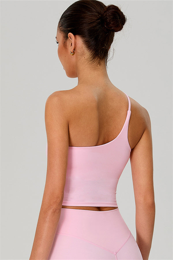 Fitglutes activewear one-shoulder crop top and shorts 2-piece set, stylish gymwear for workout and sports activities.