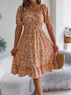 Shopimist floral puff sleeve dress with ruffled hem, featuring a feminine design and lightweight fabric.