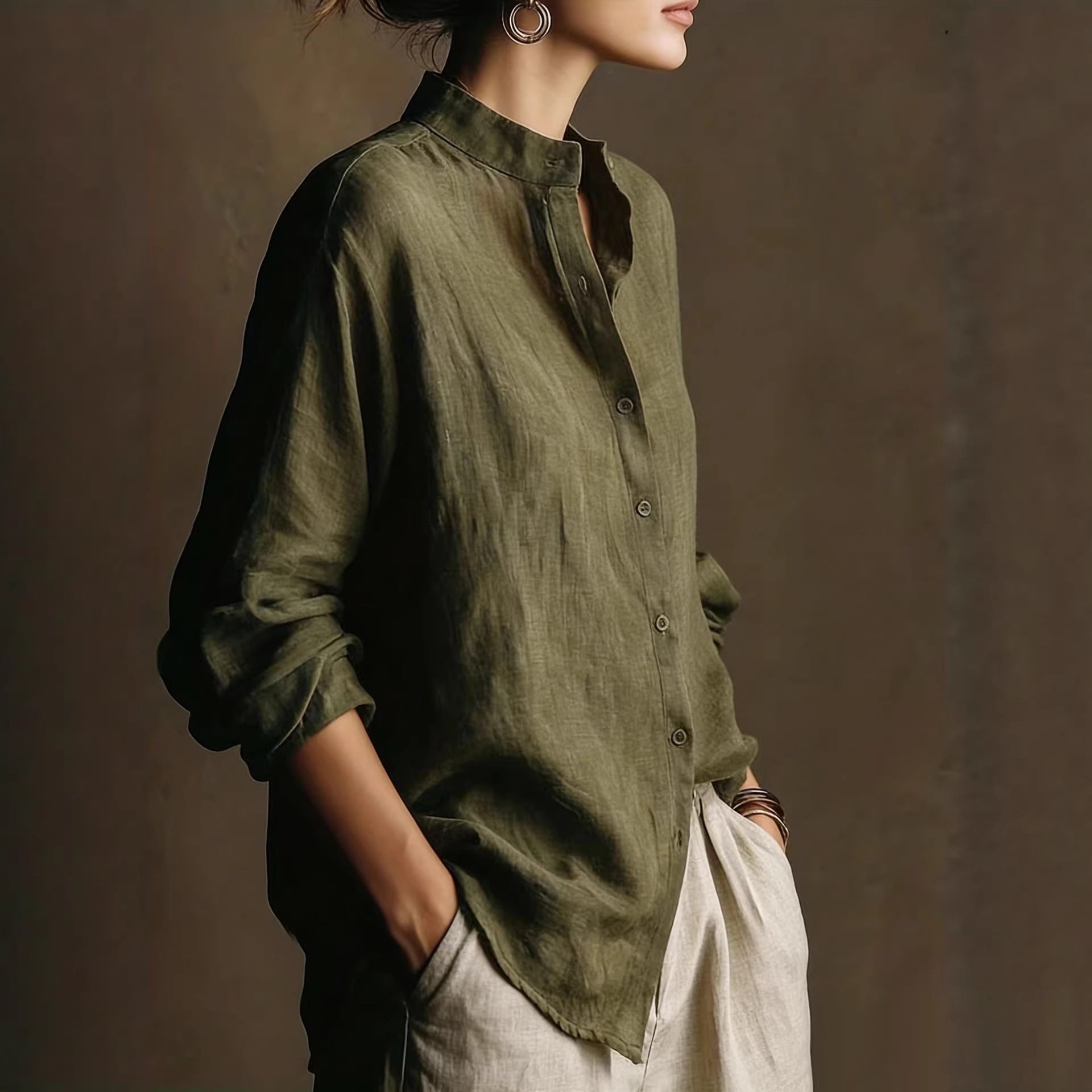 Women's loose-fit cotton linen long sleeve shirt with flip collar by FitiqueFit, shown in natural fabric and relaxed style.