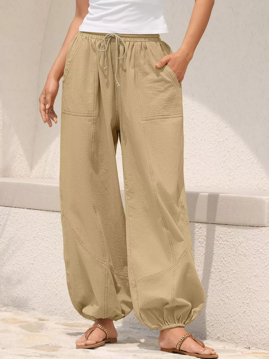 Casual loose fit harem joggers with drawstring waist from Trendsi, featuring relaxed style and comfortable fit for everyday wear.