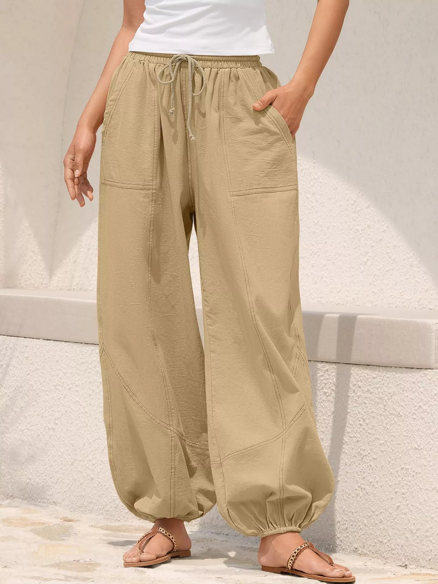 Casual loose fit harem joggers with drawstring waist from Trendsi, featuring relaxed style and comfortable fit for everyday wear.