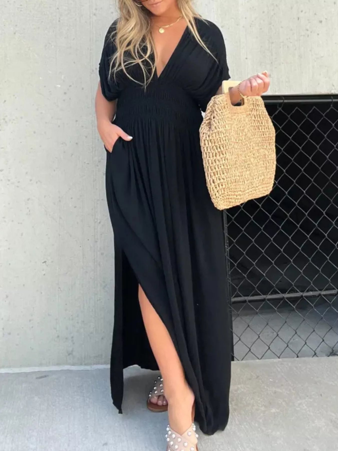 Plus size maxi dress with slit V-neck and smocked waist, featuring a flowy silhouette and trendy design from Trendsi.