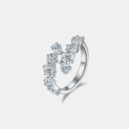 Sterling silver bypass ring with 2.6 carat moissanite gemstone, elegant and sparkling jewelry design.