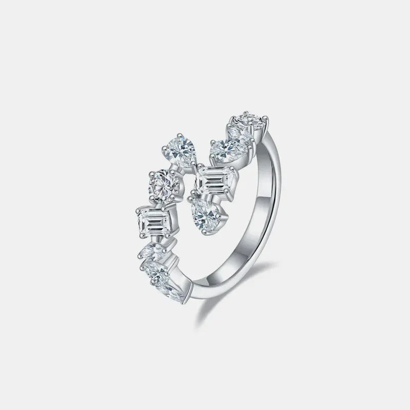 Sterling silver bypass ring with 2.6 carat moissanite gemstone, elegant and sparkling jewelry design.