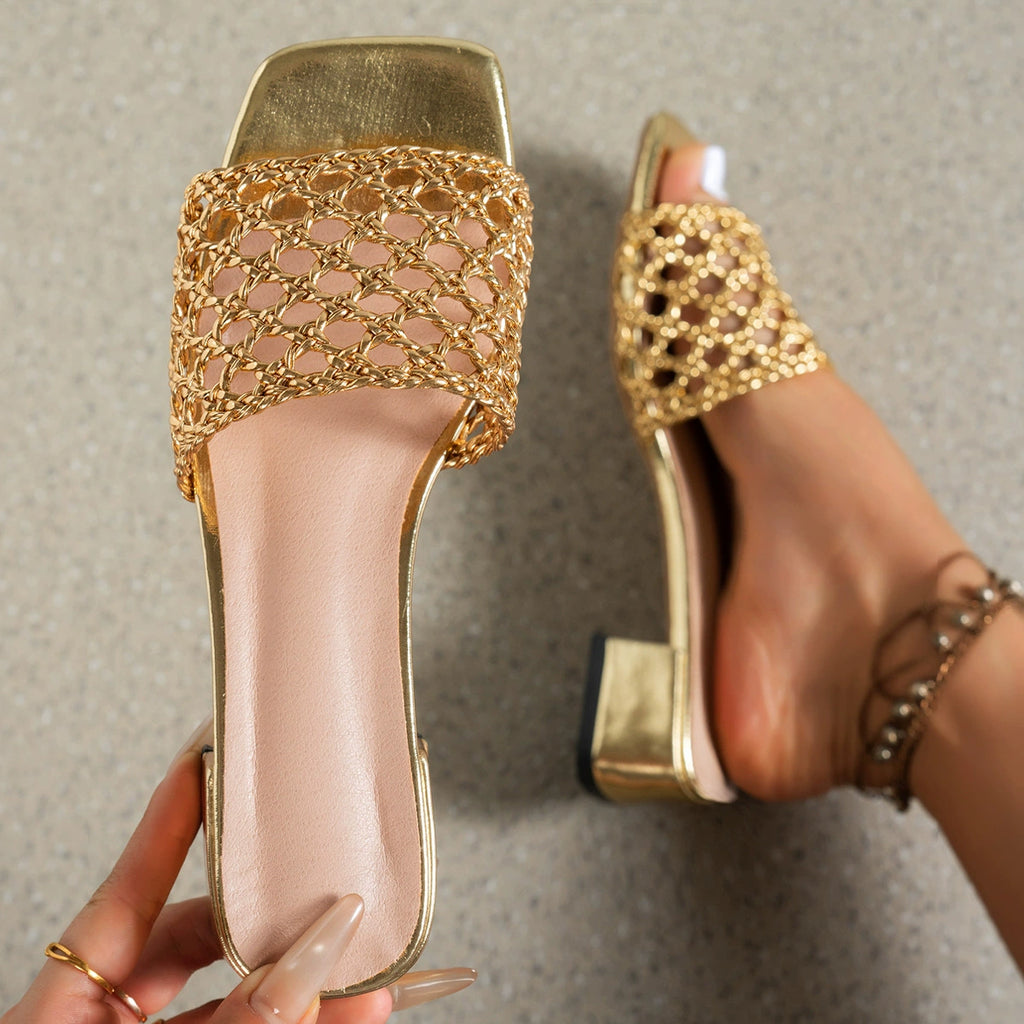 Women's woven block heel sandals by Trendsi featuring comfortable mid-heel design and stylish dress shoe appearance.