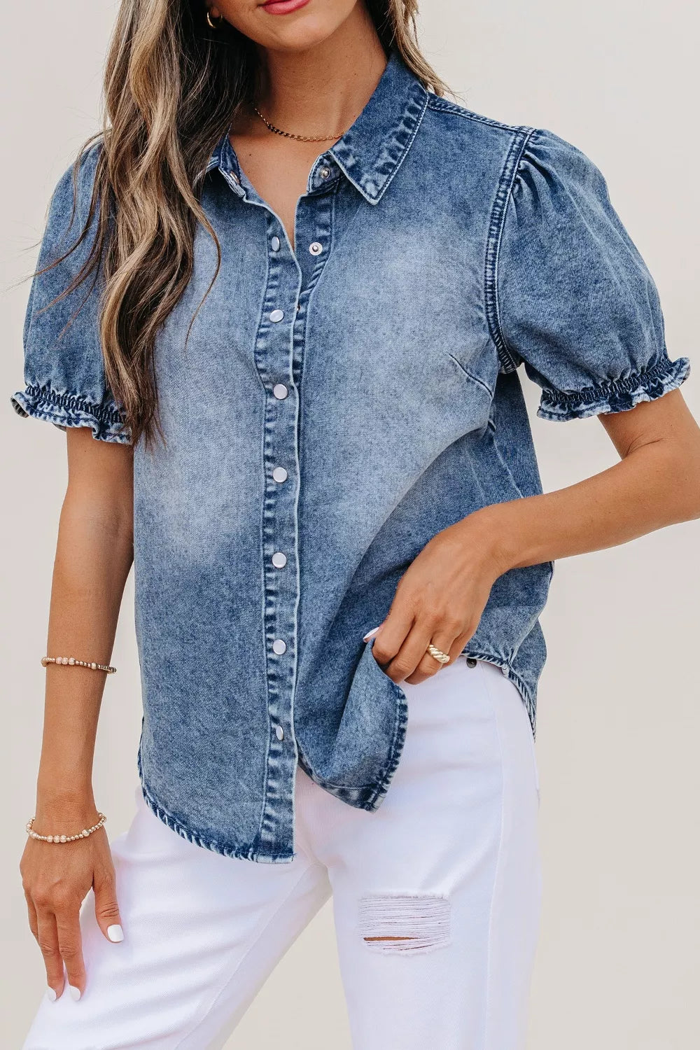 Denim shirt with frilled short sleeves and snap buttons, stylish Plush Fashion Hub women's casual top.
