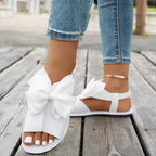Shopimist open toe bow sandals with stylish straps and a decorative bow on the front, perfect for warm-weather wear.