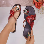 Plush Fashion Hub braided thong sandals with heart-shaped decor, featuring stylish straps and comfortable flat sole.