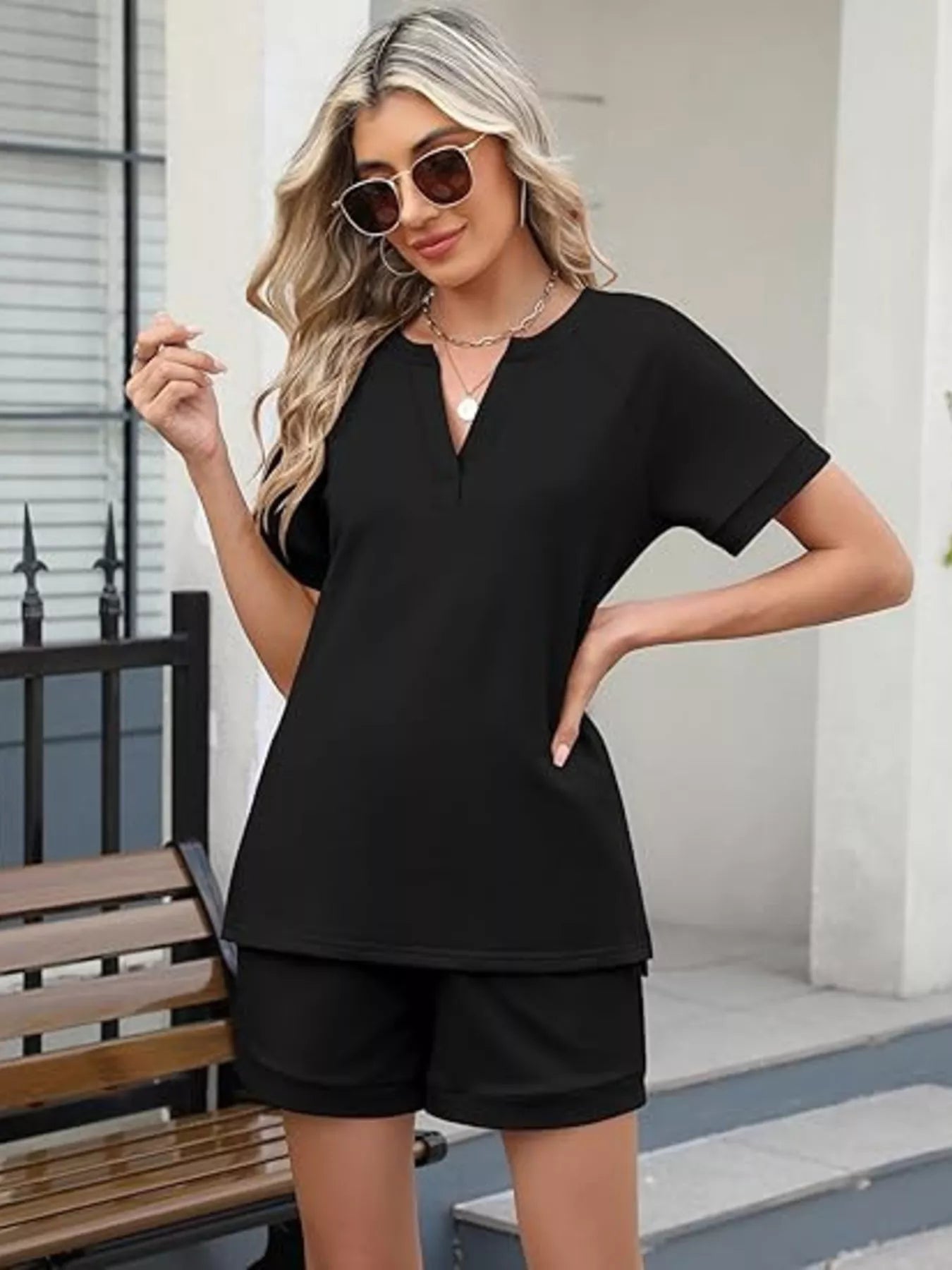 Trendsi solid color short sleeve top and matching shorts two-piece set, casual summer outfit, lightweight fabric, front view.