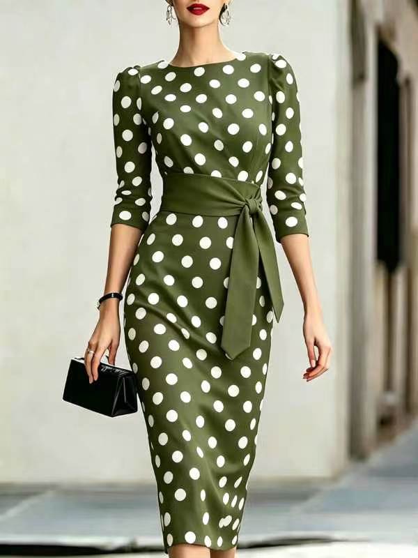 Women's retro polka-dot bodycon midi dress by FitiqueFit featuring a belted cross-tie waist, perfect casualwear with vintage style.