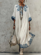 Women's printed batwing sleeve midi dress in linen blend fabric, loose fit with floral patterns, from Plush Fashion Hub.