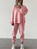 Women's loose fit crewneck sweatshirt and jogger pants two-piece set by Plush Fashion Hub, casual comfortable loungewear.