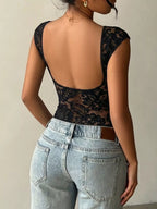 Lace detail cap-sleeve T-shirt from Trendsi, featuring a stylish design with delicate lace accents on a casual top.