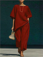Contrast trim round neck top and pants set by Plush Fashion Hub, featuring a casual look with matching pieces and trim details.