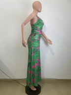 Printed halter neck maxi dress by Shopimist featuring vibrant floral pattern and flowing fabric for elegant summer wear.