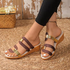 Women's open toe mid-heel wedge sandals by Trendsi featuring a chic style, comfortable fit, and casual footwear design.