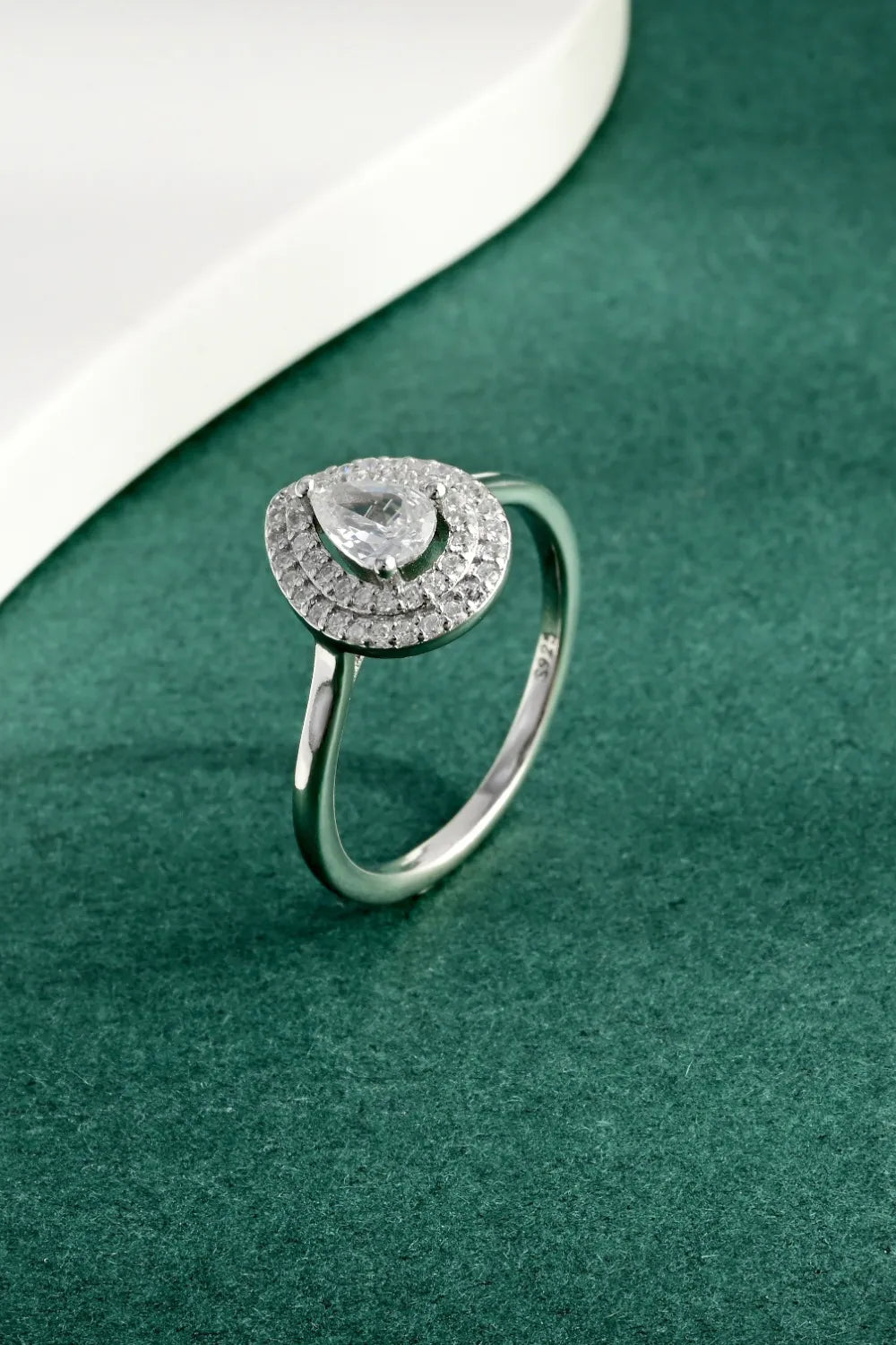925 Sterling Silver Inland Zircon Ring featuring a sparkling zircon centerpiece and intricate band design.