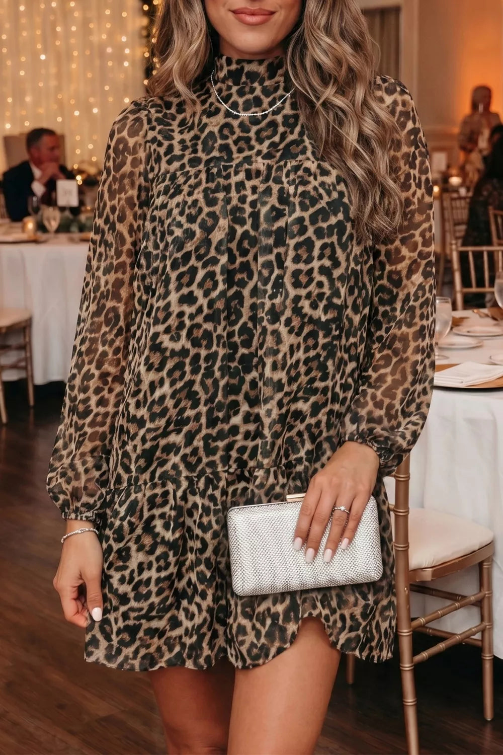 Leopard print long sleeve short shift dress by Shopimist, featuring a stylish and comfortable design with bold animal print pattern.