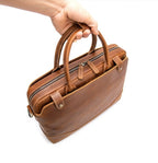 Plush Fashion Hub Crazy Horse leather men's briefcase with sturdy handle and sleek design, ideal for professional use.