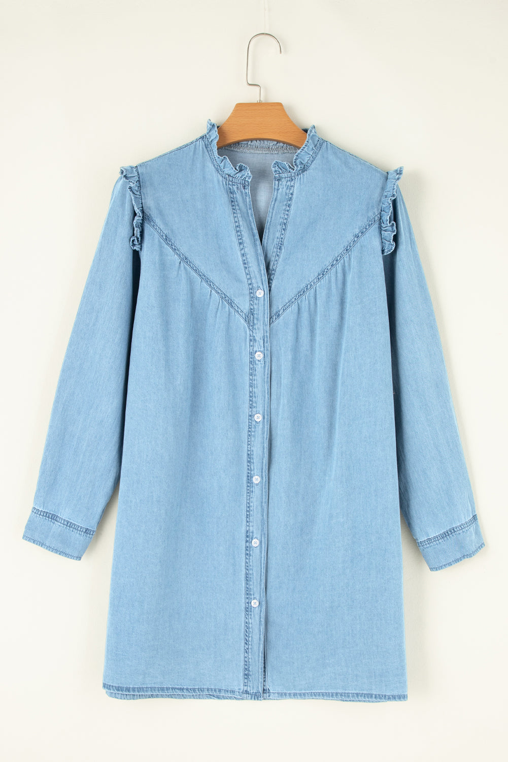 VYSN button-up notched long sleeve denim dress displayed on a model, showcasing its classic collar and stylish design.