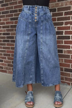 High-waisted wide-leg cotton denim jeans by Plush Fashion Hub with button-fly closure and classic fit, shown on a model.