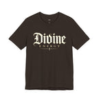 Black T-shirt from Wear Your Worship with Gothic script "Divine Energy" faith graphic, casual fit and bold design.