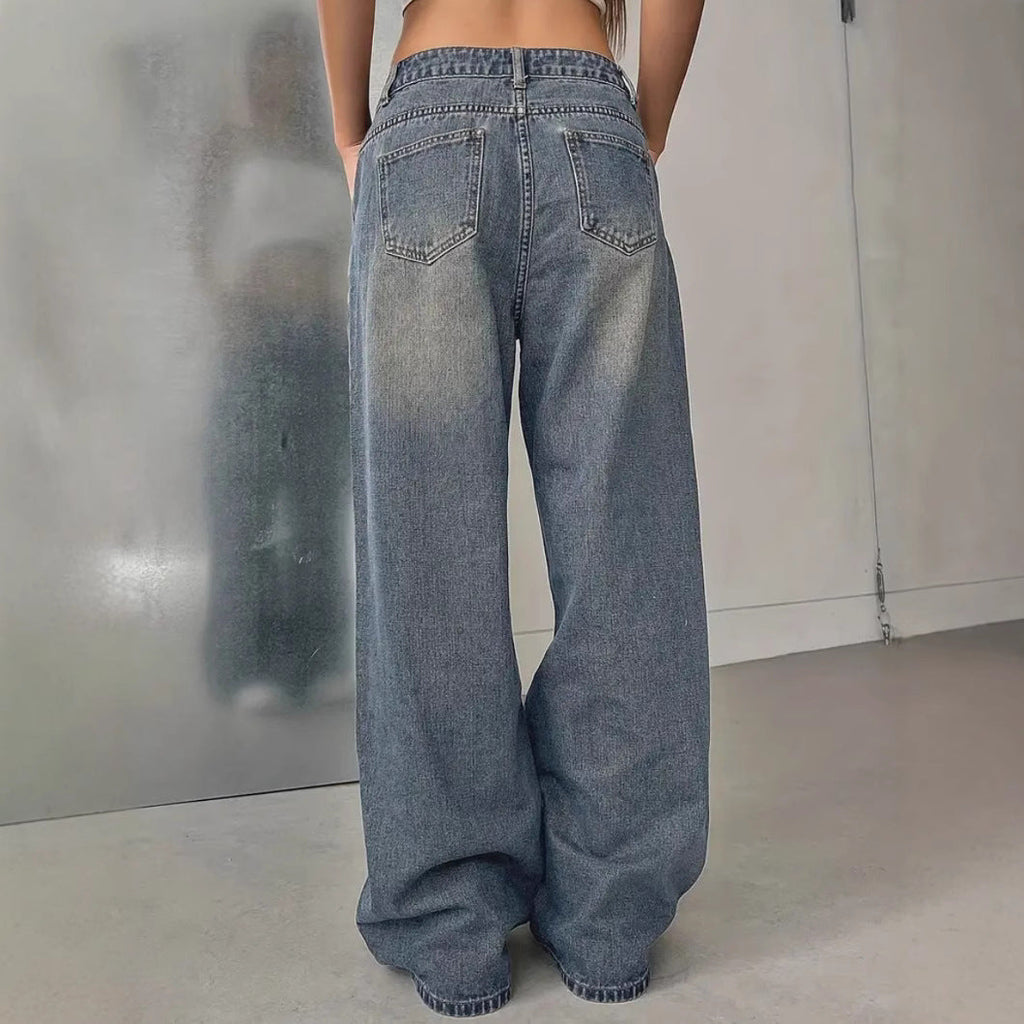 European and American women's vintage denim pants by LadyShow.Store, featuring washed, distressed denim with a relaxed fit.