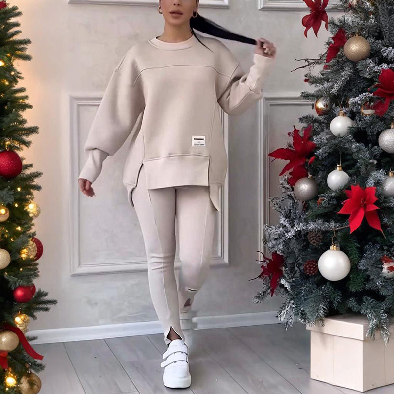 Women's solid color 2-piece casualwear set from Plush Fashion Hub, featuring a relaxed top and matching pants.