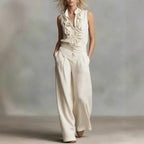 Women’s linen blend two-piece casualwear set by FitiqueFit featuring a sleeveless shirt and wide-leg pants, styled for comfort.